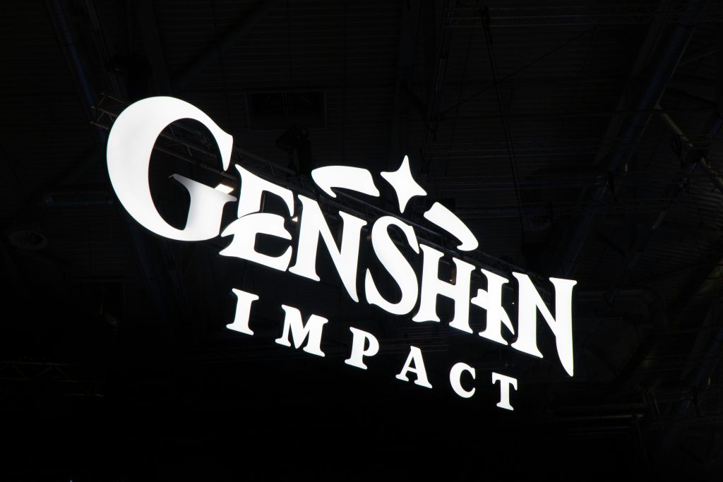 black and white LED sign that says Genshin Imapact