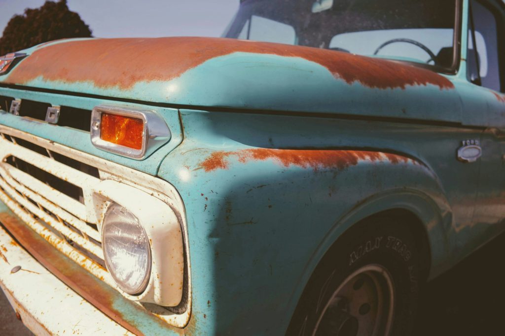 Front view of a 1965 Ford Truck with sealed beam headlights, off.